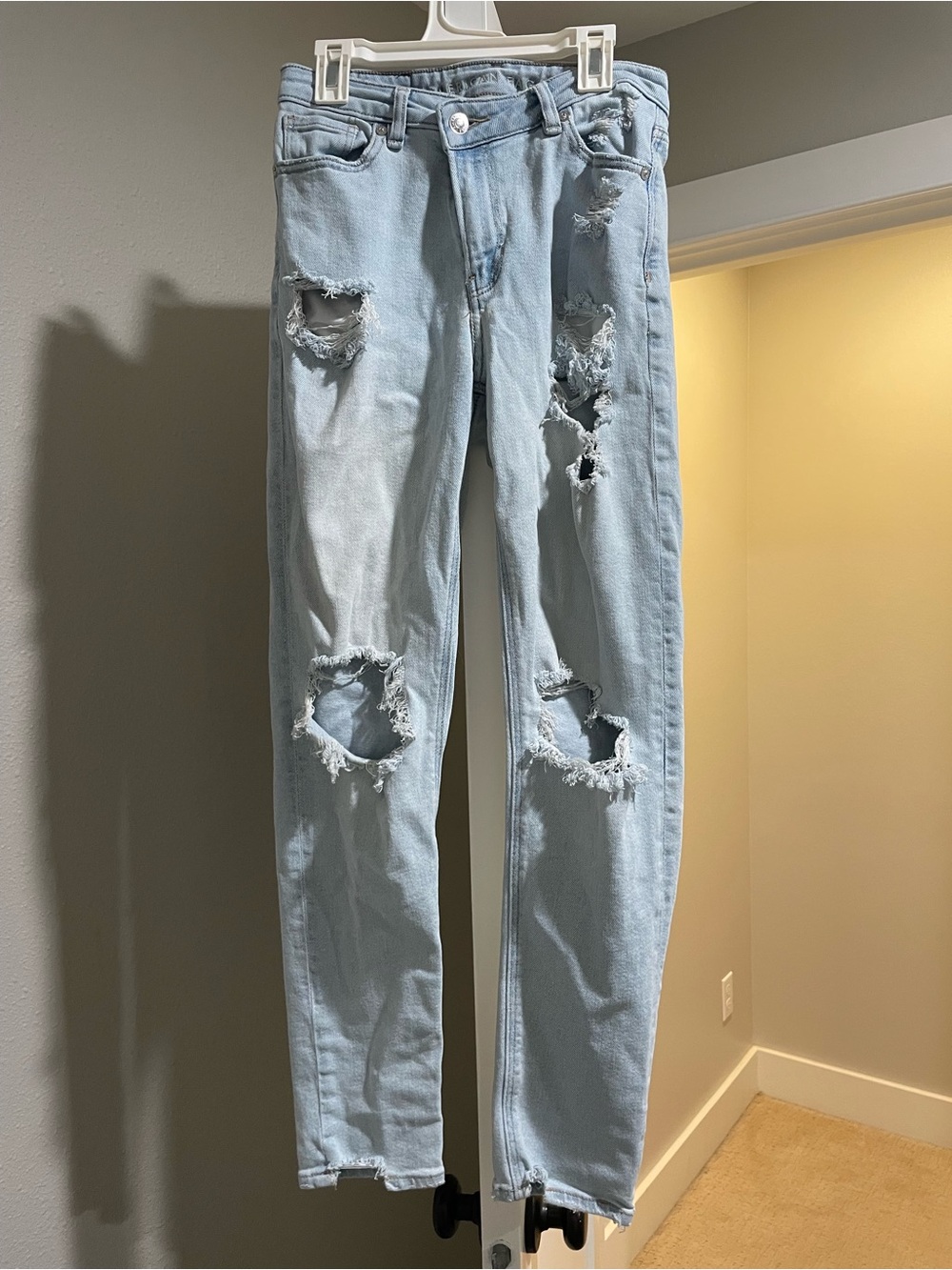 American Eagle Light Blue Denim Jeans with Brown Leather Patch